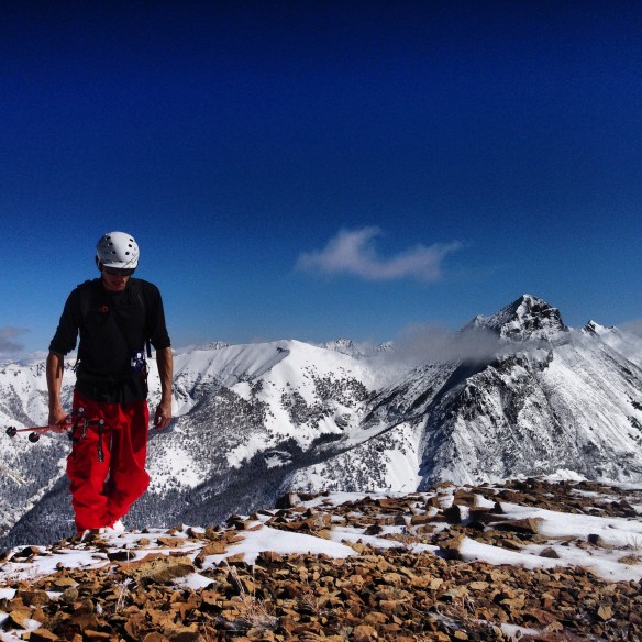 Andrew on the summit. The Devil's Bedstead provides a perfect backdrop. 